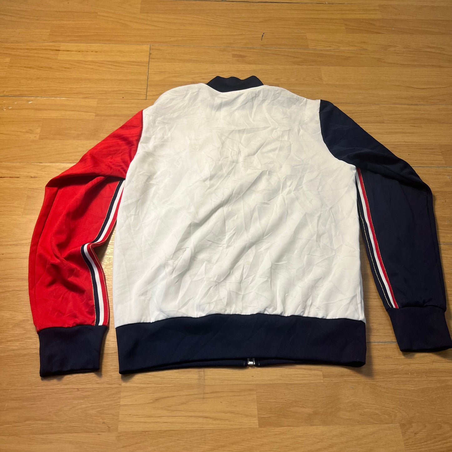 Veste sportive blanc, bleu et rouge - Le Coq Sportif France 1882