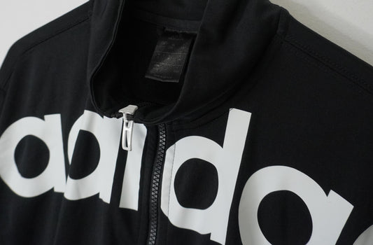 Veste de survêtement noire et blanche Adidas – taille L