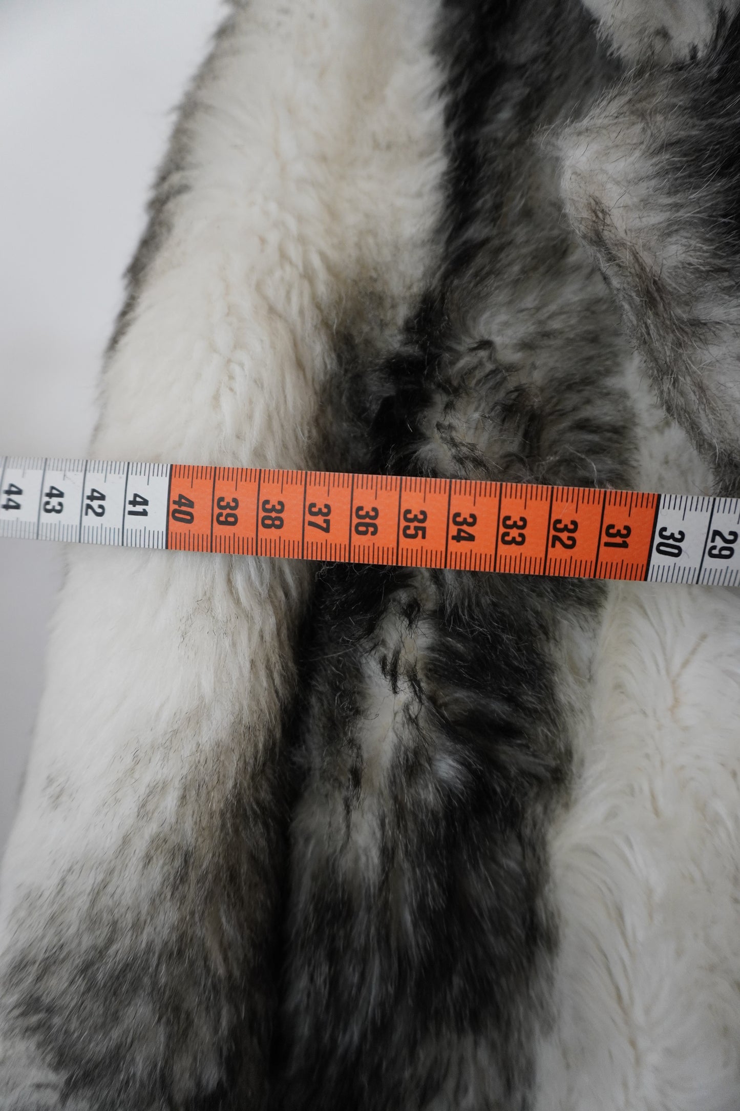 Manteau fourrure noir et blanc – Taille – M