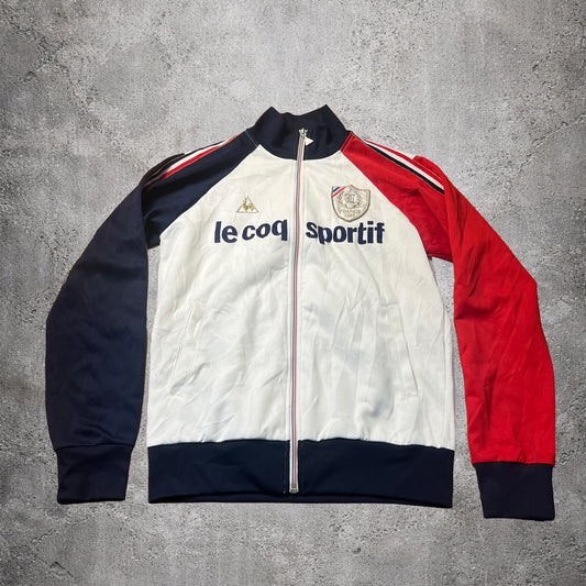 Veste sportive blanc, bleu et rouge - Le Coq Sportif France 1882