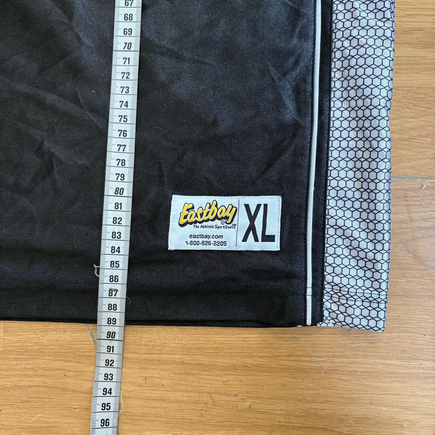 Maillot de basketball noir et blanc Eastbay – Taille XL