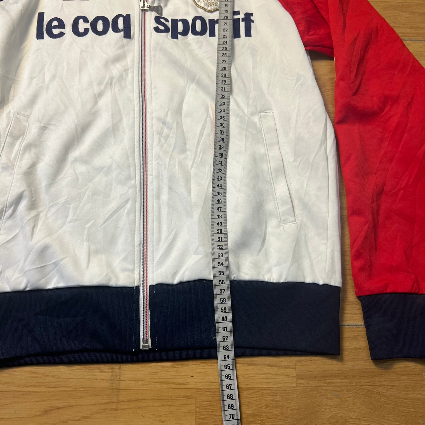 Veste sportive blanc, bleu et rouge - Le Coq Sportif France 1882