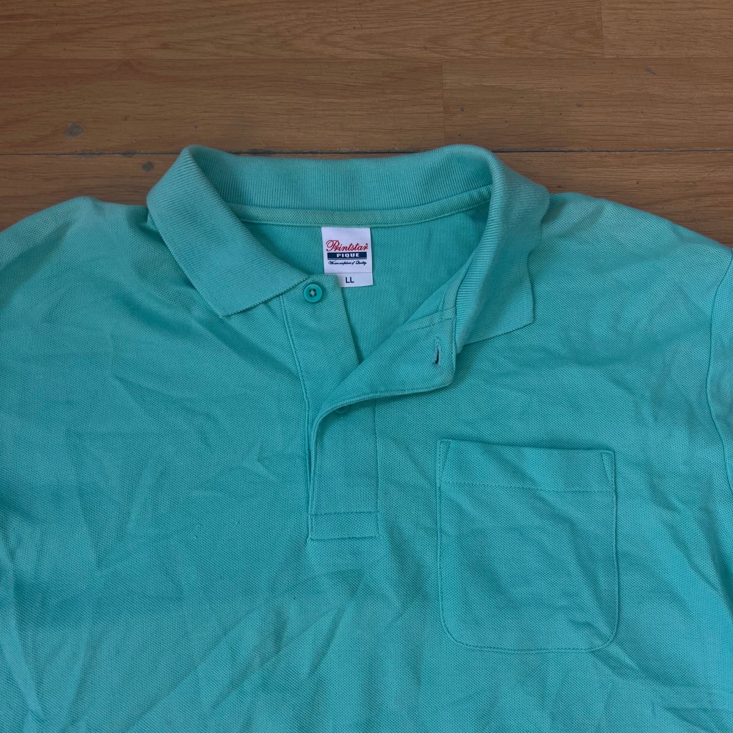 Polo manches longues turquoise - Taille L by SARLOTTE