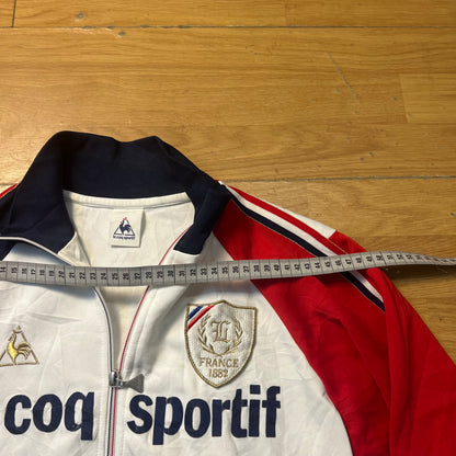 Veste sportive blanc, bleu et rouge - Le Coq Sportif France 1882