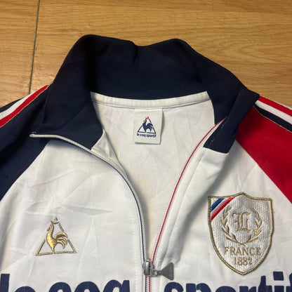 Veste sportive blanc, bleu et rouge - Le Coq Sportif France 1882