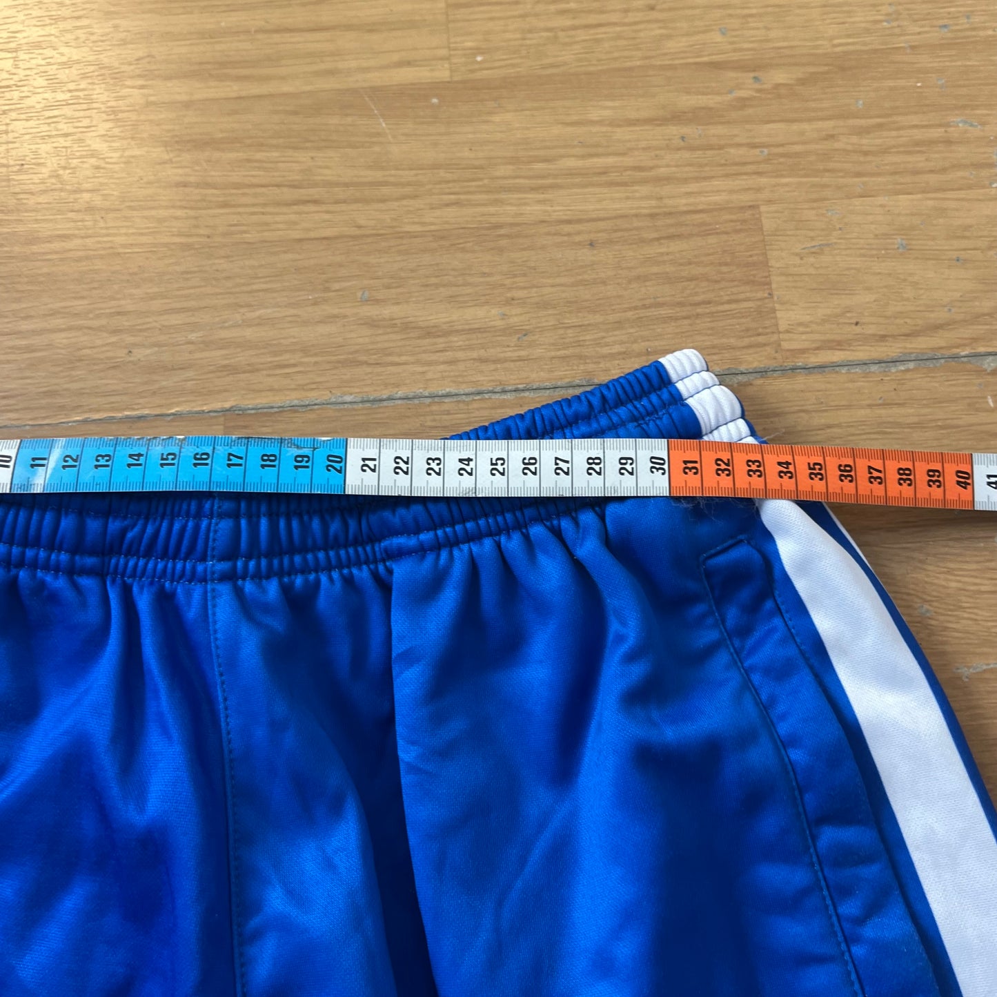 Pantalon de sport bleu avec détails blancs et jaunes - Taille L