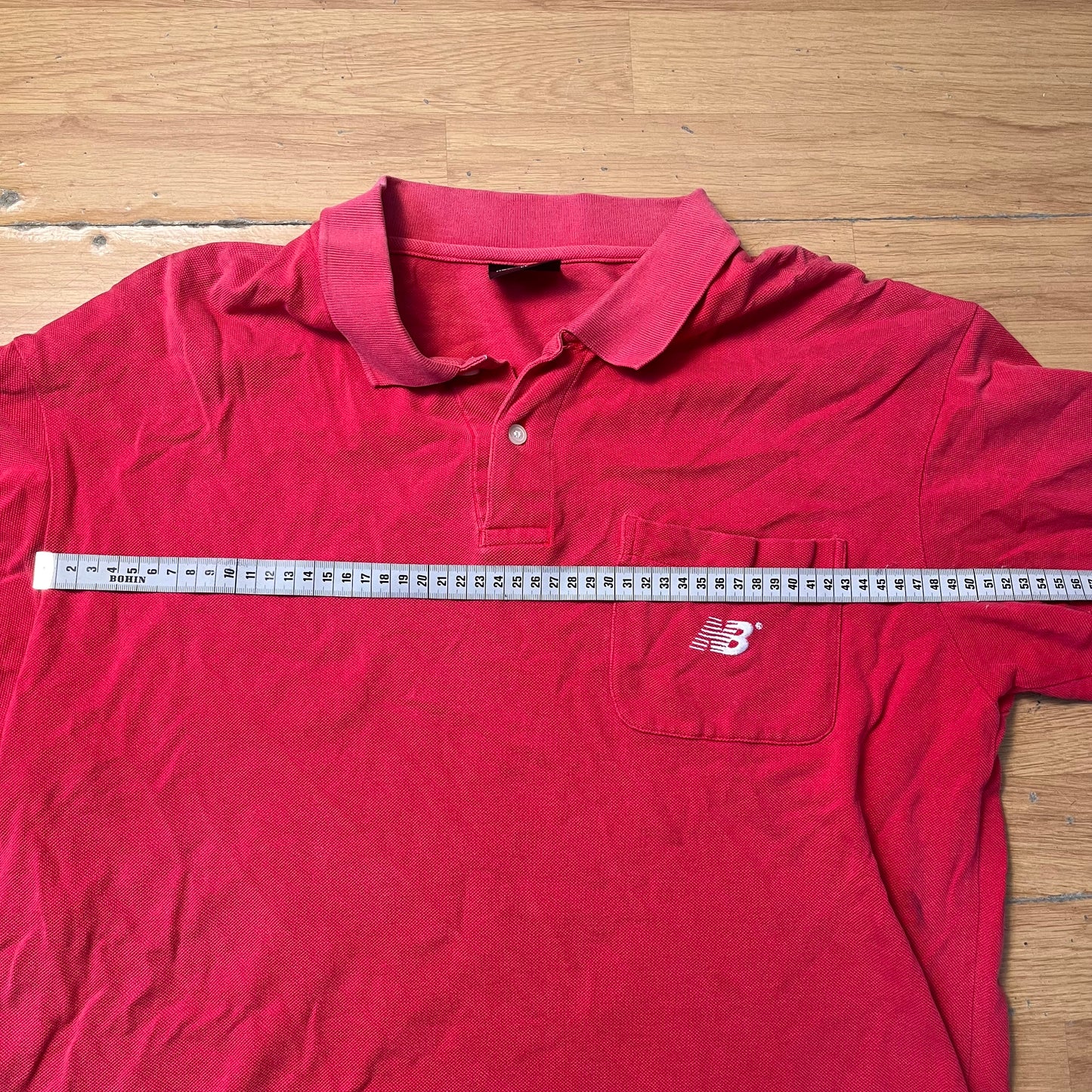 Polo rouge New Balance – Taille – L